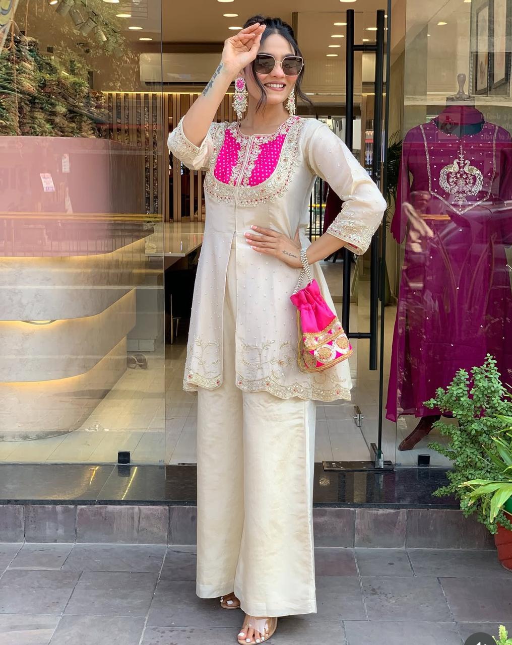 Elegant Ivory Embroidered Kurta Set with Pink Detailing