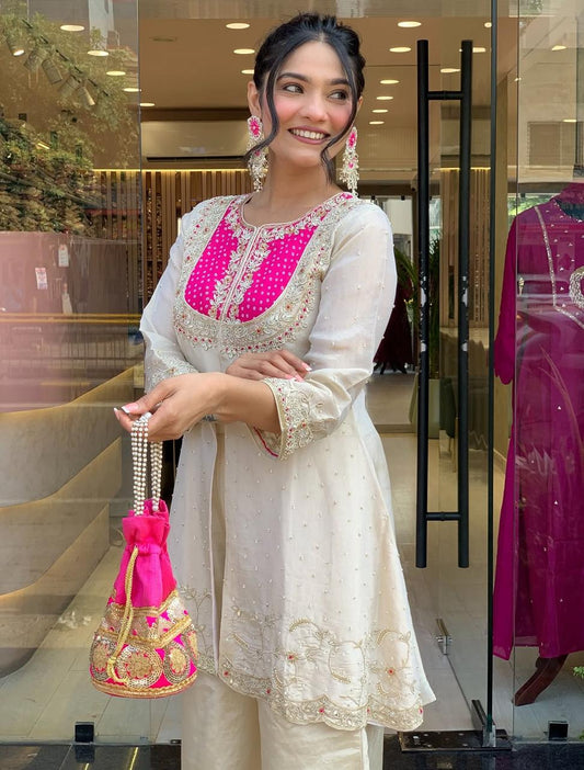 Elegant Ivory Embroidered Kurta Set with Pink Detailing