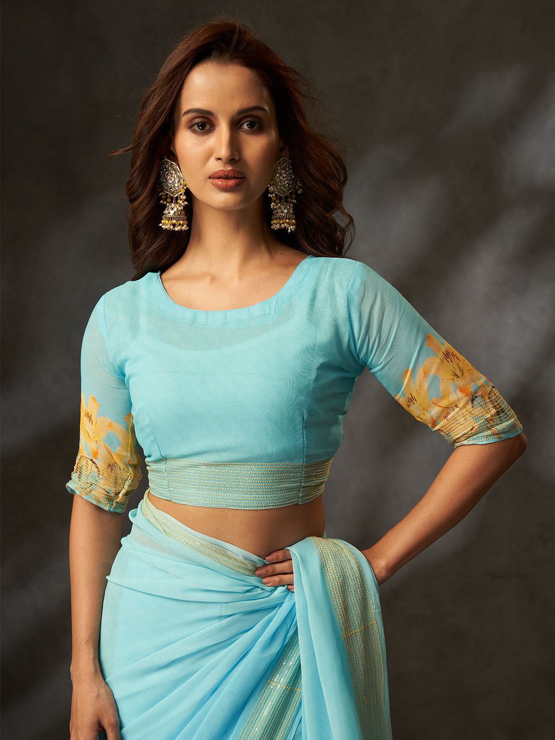 The delicate floral print combined with a subtle shimmering border