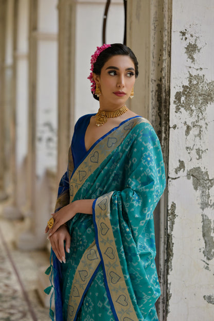Sundari- Ikat Print Silk Blend Saree with Heart Motif Zari Border