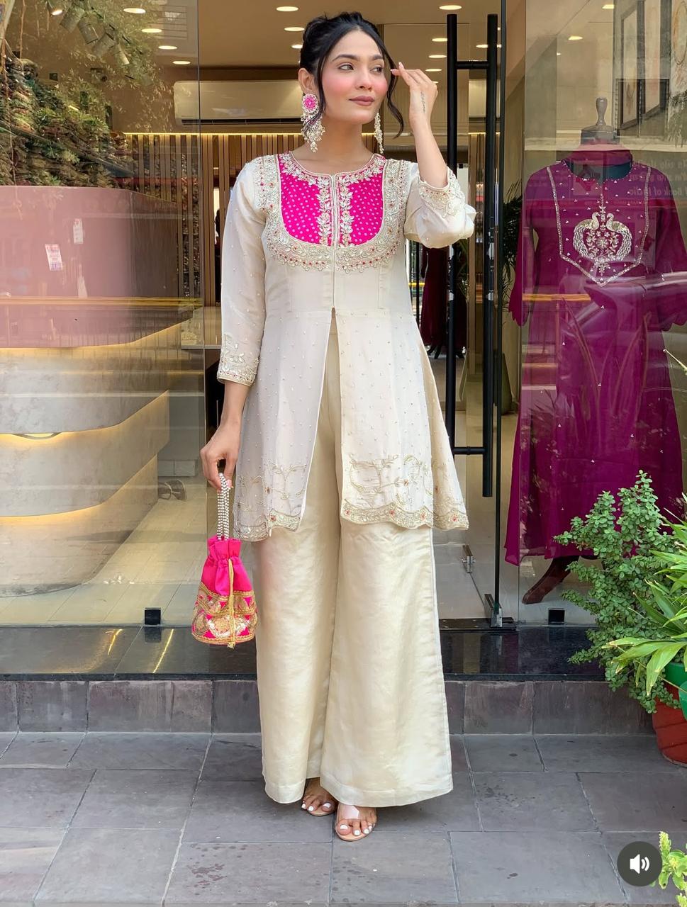 Elegant Ivory Embroidered Kurta Set with Pink Detailing