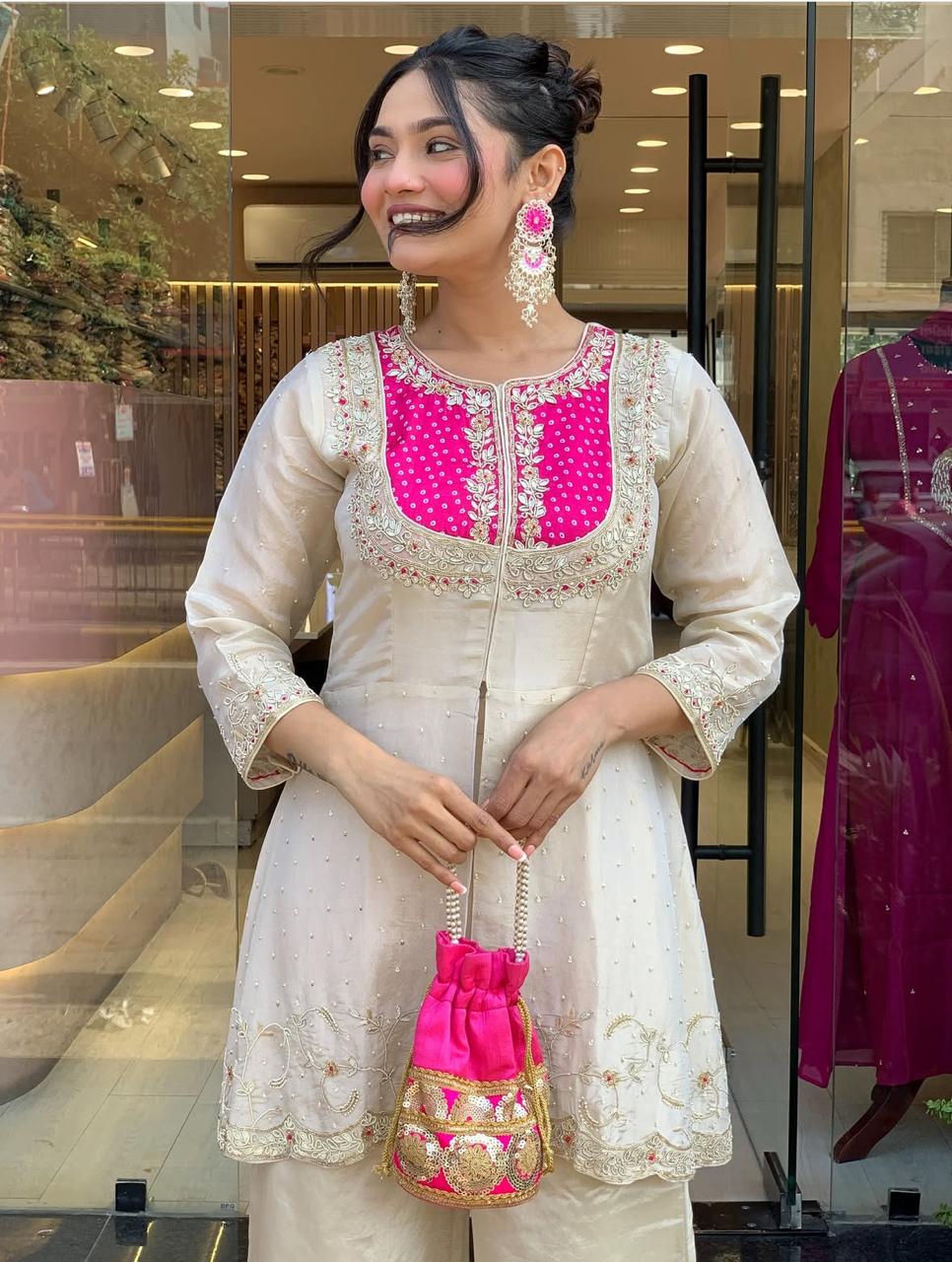 Elegant Ivory Embroidered Kurta Set with Pink Detailing