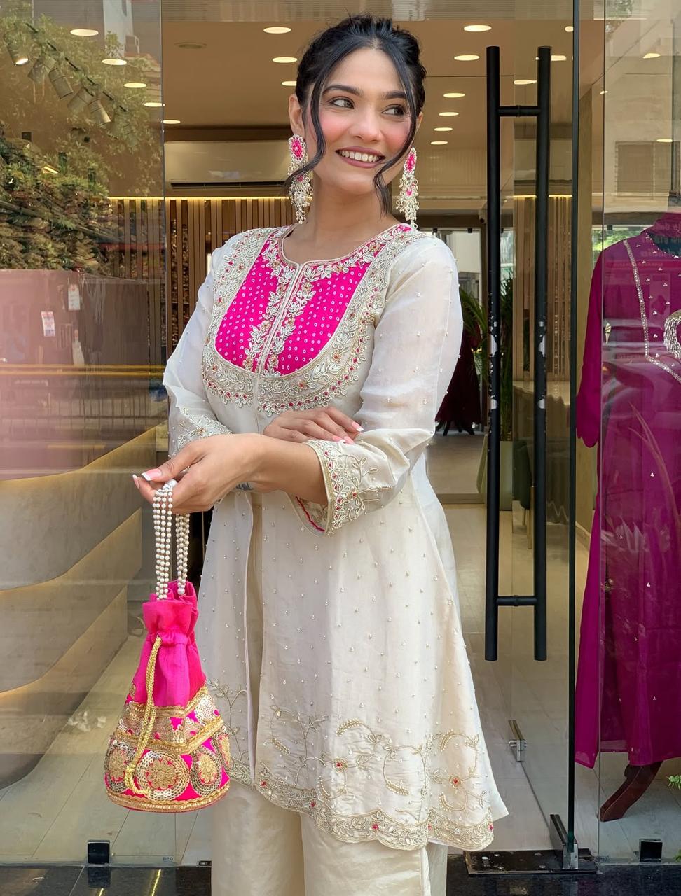 Elegant Ivory Embroidered Kurta Set with Pink Detailing